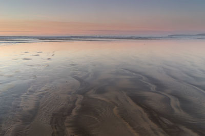 Sunset on westward ho beach, devon 