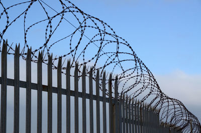 Fence against blue sky