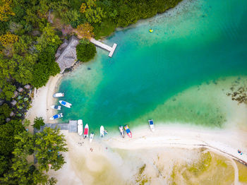 Aerial view of boats moored at beach