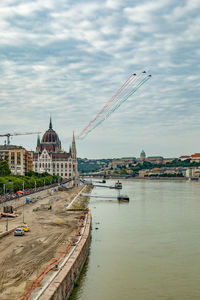 Panoramic view of buildings against sky in city