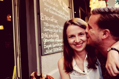 Portrait of smiling young woman