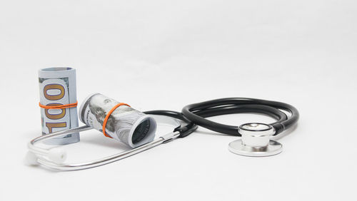 High angle view of electric lamp on table against white background