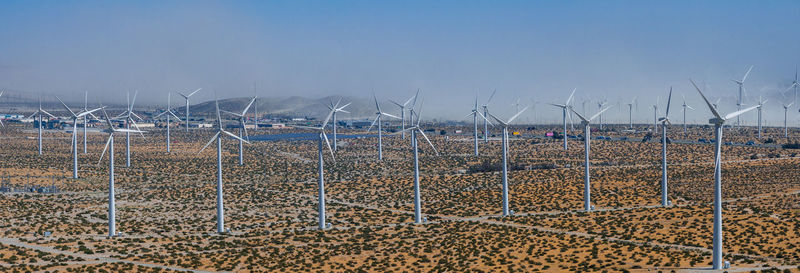 Scenic view of field against clear sky