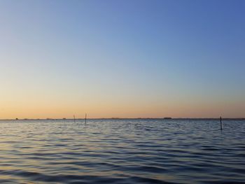 Scenic view of sea against clear sky