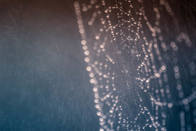 Full frame shot of illuminated water at night