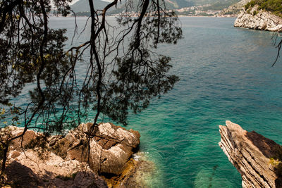 High angle view of rocks by sea