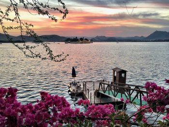 Scenic view of lake against sky during sunset