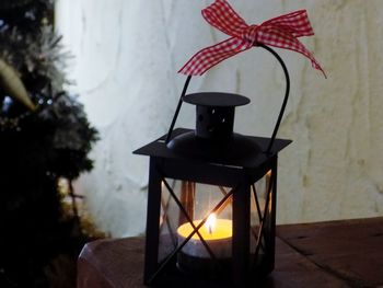 Close-up of christmas tree on table at home