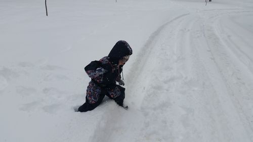 Person on snow covered field