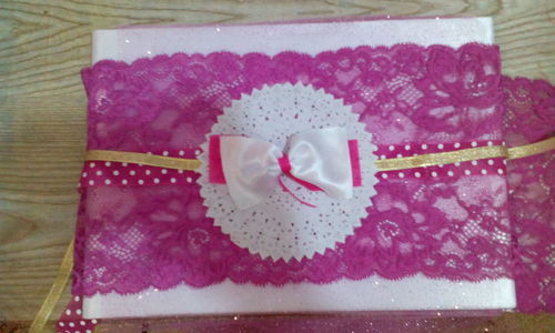 High angle view of pink cake on table