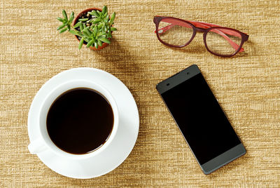 High angle view of coffee on table