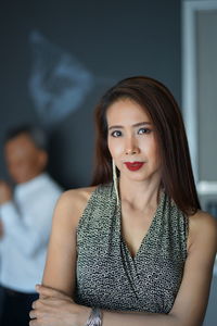 Close-up portrait of beautiful woman at home