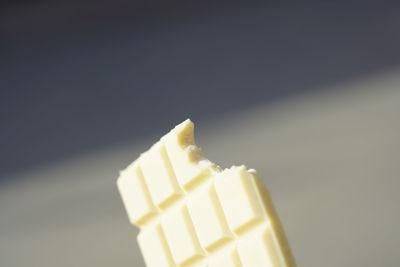 Close-up of cake against white background