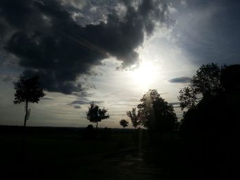 Scenic view of landscape against cloudy sky