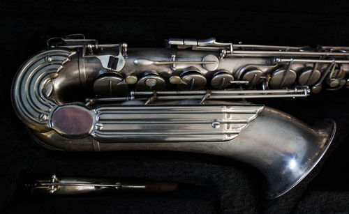 Close-up of musical instrument on black background