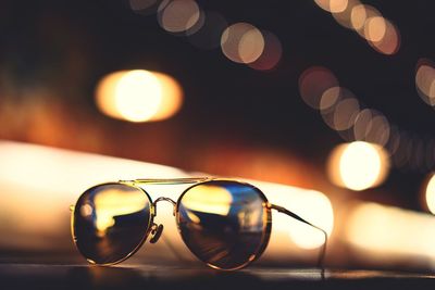 Close-up of sunglasses against blurred background