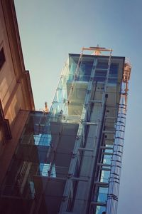 Low angle view of buildings against clear sky