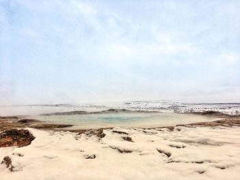 Scenic view of beach against sky