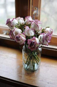 Close-up of flower vase on table