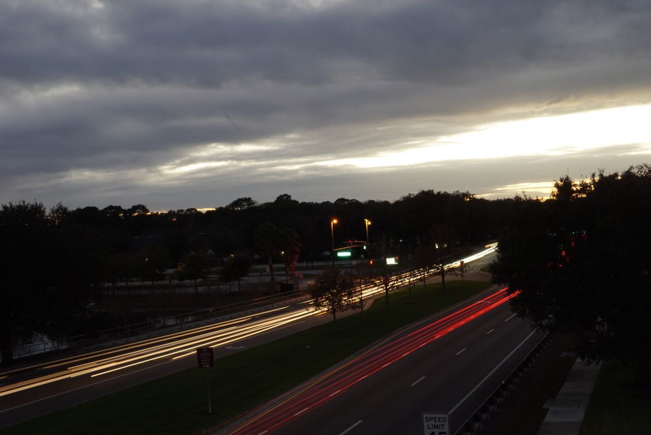 transportation, illuminated, traffic, no people, sky, tree, road, city, outdoors, night, sunset, cloud - sky, architecture, nature