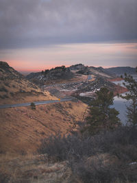 Scenic view of landscape against sky during sunset