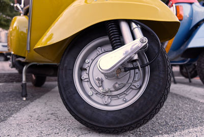 Close-up of vintage car on street