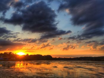 Scenic view of sunset over sea