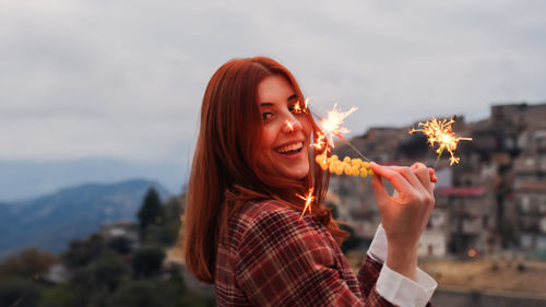 Young beautiful italian girl celebrates women's day with sparkling and mimosa