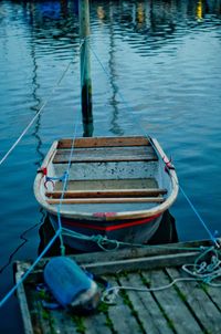 Boat moored on lake