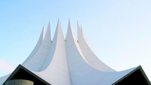 Low angle view of building against blue sky