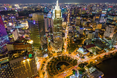 High angle view of illuminated city buildings at night