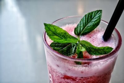 Close-up of fresh drink with ice cream