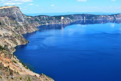 High angle view of lake against blue sky