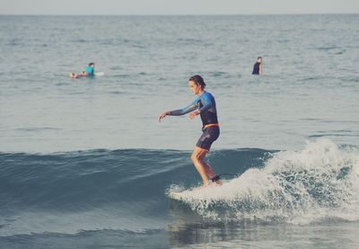 People surfing in ocean