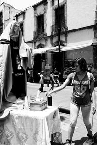 Woman standing in city