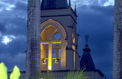 Low angle view of illuminated cathedral against sky