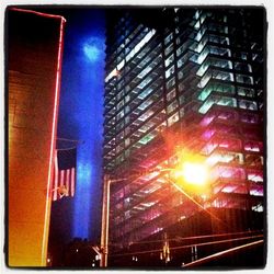 Low angle view of illuminated building at night