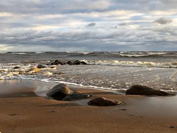 Scenic view of beach against sky