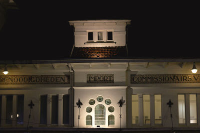 Low angle view of illuminated building at night