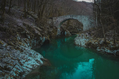 Arch bridge over river