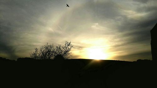 Scenic view of landscape against cloudy sky