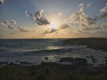 Scenic view of sea against sky during sunset