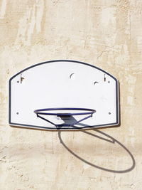 Close-up of basketball hoop on wall