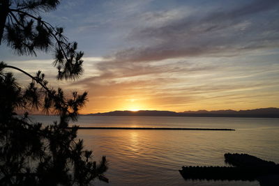 View of calm sea at sunset