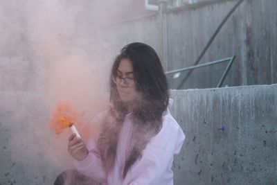 Close-up of a hand holding the wall