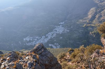 High angle view of lake by mountain