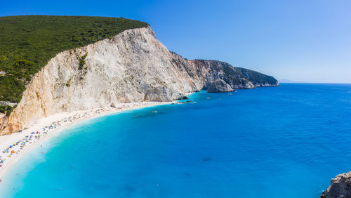 Scenic view of sea against clear blue sky