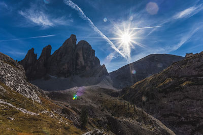 Rays of the sun near awesome dolomitic peak, south tyrol, italy