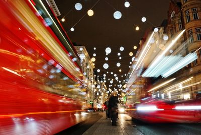 Blurred motion of car on road at night