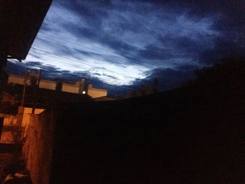 Low angle view of building against sky at night